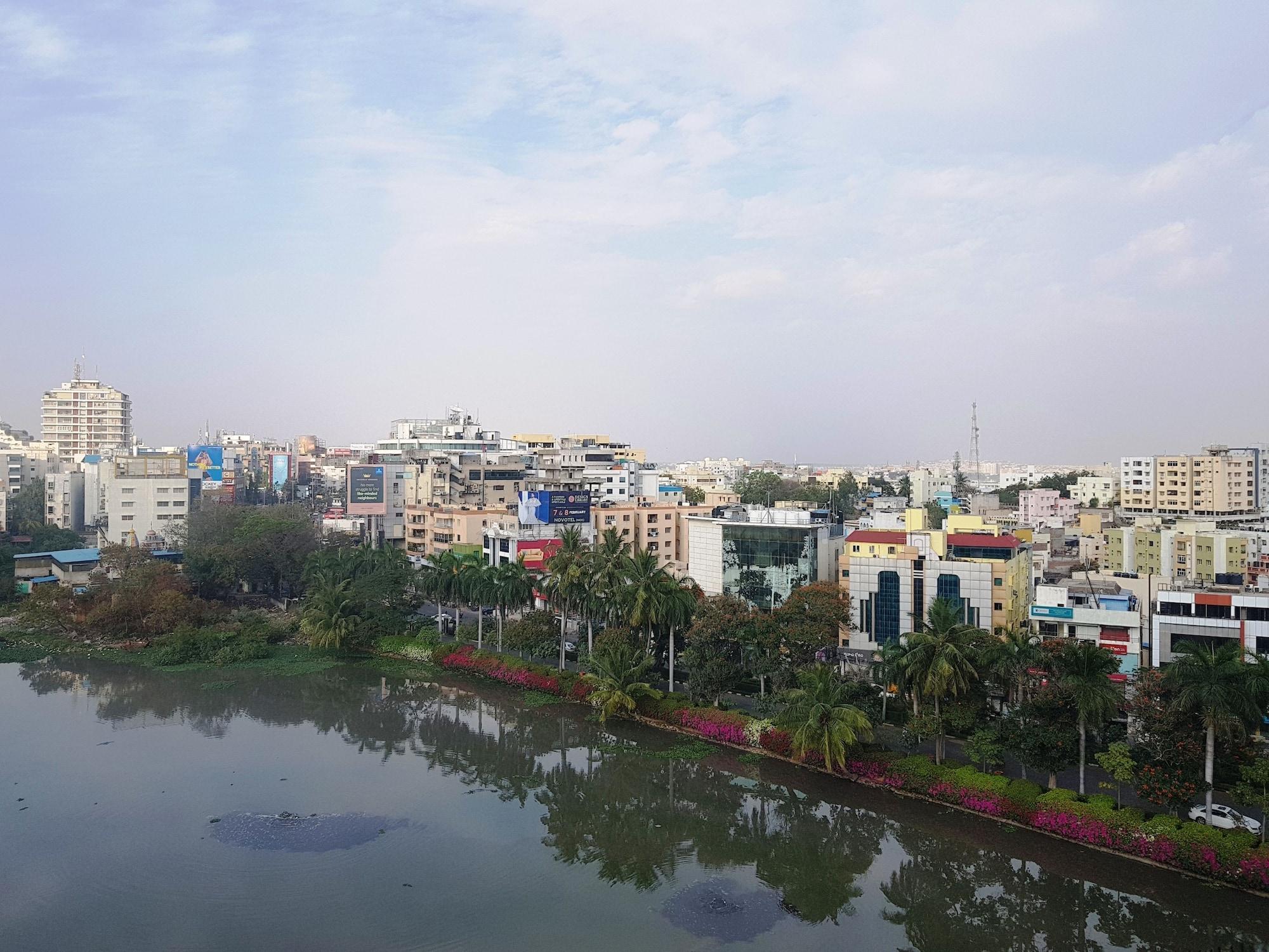 Taj Banjara Hotell Hyderabad Exteriör bild View of the city from the lake