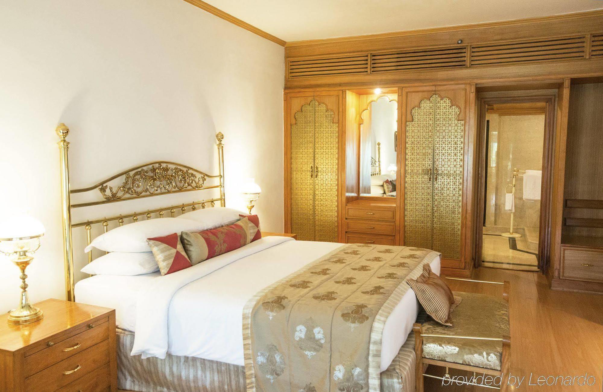 Taj Banjara Hotell Hyderabad Exteriör bild A bedroom at the Taj Mahal Palace